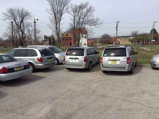 Chesterfield Taxicab: 4 Taxis in parking